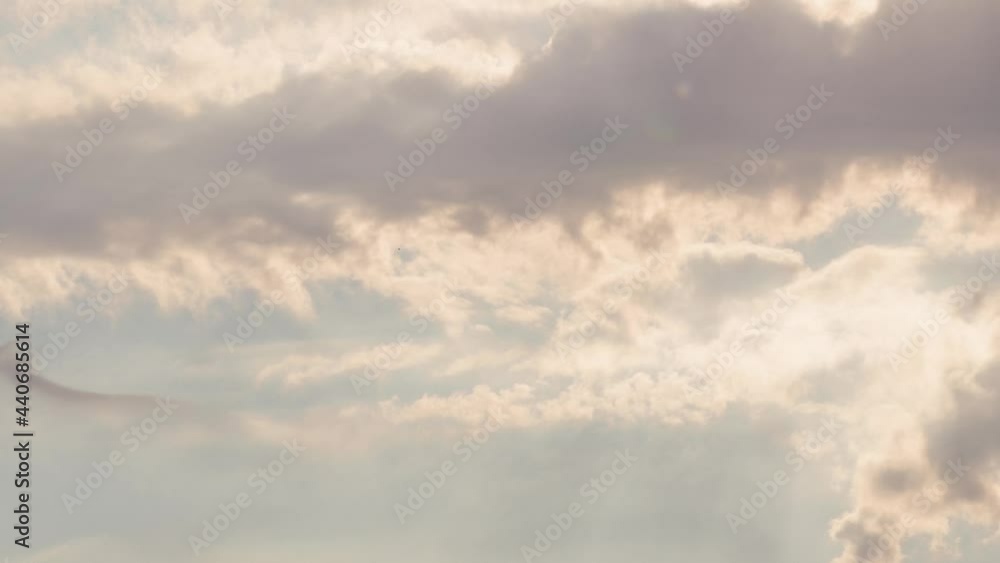 Time Lapse Of Storm Cloud Formations Passing By With Sun Rays Shining Through Time Lapse Of Storm Cloud Formations Passing By With Sun Rays Shining Through
