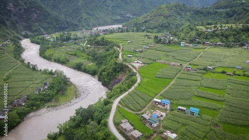 Landscape of hill with farm houses in Gulmi Nepal, aerial video photo