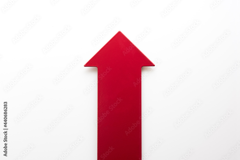 Big real red arrow for presentation or slide show. pointing up for growth or increase or boost. Natural white background. Big real red arrow for presentation or slide show. pointing up for growth or increase or boost. Natural white background.