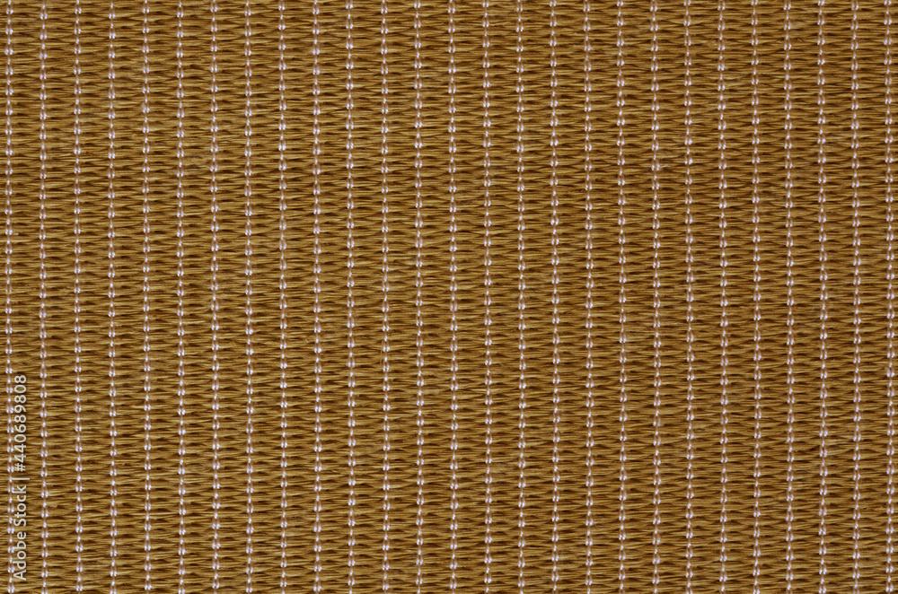 Texture on the back of the tatami mat. Mat made of rush knitted with a string. Japanese-style floor material Texture on the back of the tatami mat. Mat made of rush knitted with a string. Japanese-style floor material