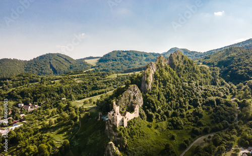 Historic ruins of Lednica castle , Slovakia travel. Summer green landscape.. photo