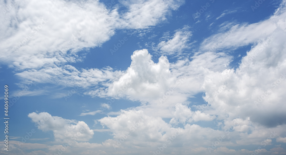 Many small clouds in blue sky.Summer cloudy.White clouds floating in the sky. Many small clouds in blue sky.Summer cloudy.White clouds floating in the sky.