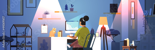 overworked businesswoman freelancer looking at computer screen woman sitting at workplace with cat