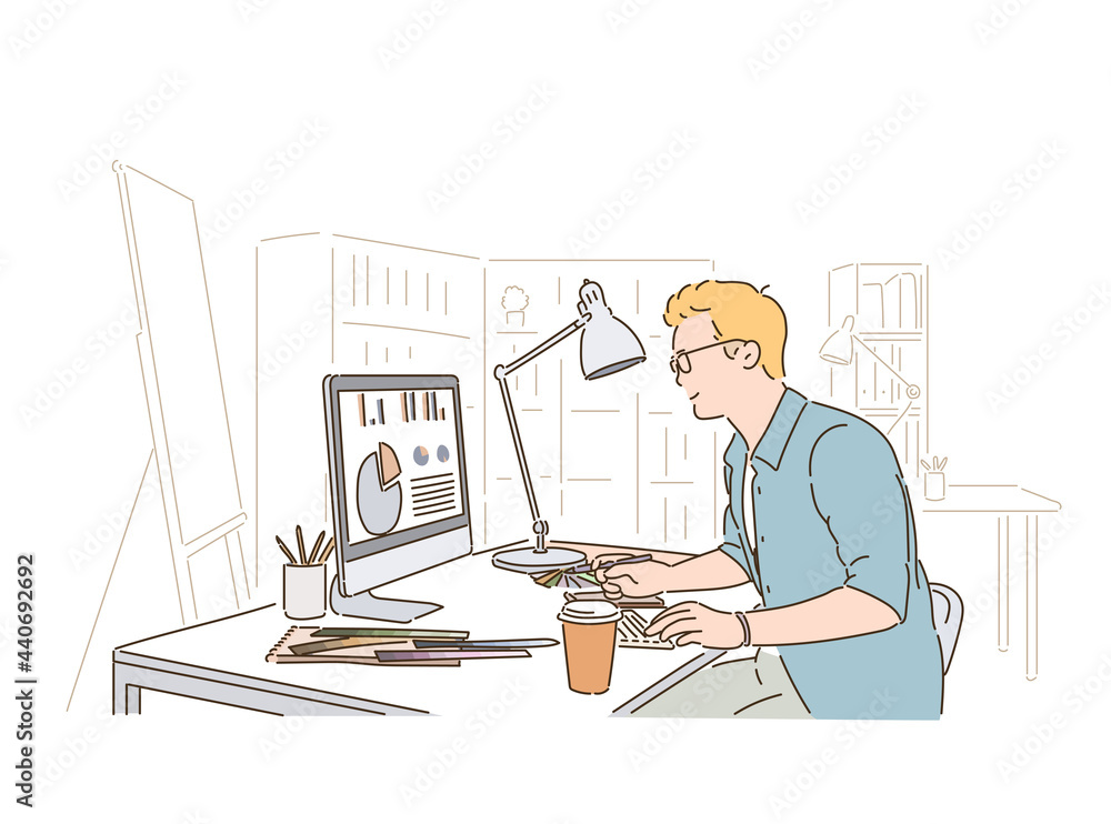 A designer is working on a computer. hand drawn style vector design illustrations. A designer is working on a computer. hand drawn style vector design illustrations.