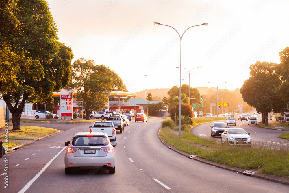 Car in heavy traffic with break lights on at sunset on multi lane road Car in heavy traffic with break lights on at sunset on multi lane road