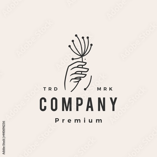 hand hold dandelion hipster vintage logo vector icon illustration