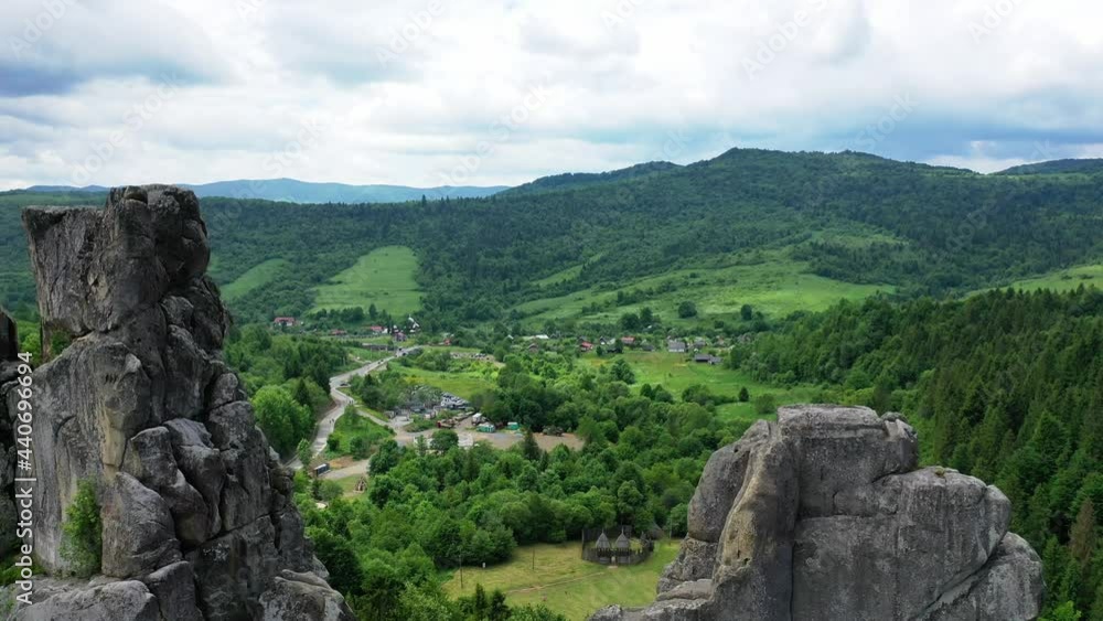 Aerial drone view of famous Ukrainian medieval cliff-side Tustan fortress ruins Aerial drone view of famous Ukrainian medieval cliff-side Tustan fortress ruins