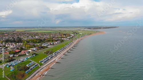 Wallpaper Mural Coastal town of Lowestoft in the county of Suffolk, England; a revealing aerial footage of a beachfront, town and coastal roads, a lovely scenic horizon with clouds and landscape including the sea. Torontodigital.ca