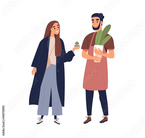 Couple of people with potted interior plants in hands. Man and woman talking ...
