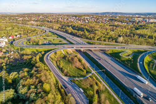 Motorway multilevel crossing. Spaghetti junction on A4 international highway, the part of freeway around Krakow, Poland. Aerial view