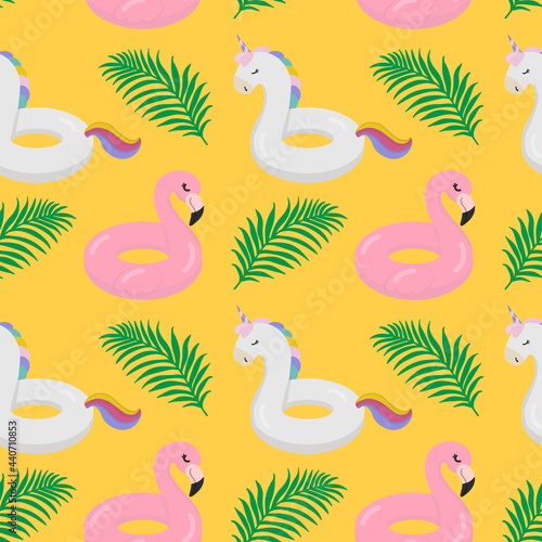 Beautiful seamless tropical pattern with Inflatable ring object with cute flamingo and unicorn shaped on a yellow background. Abstract summer texture. Design for fabric  wallpaper  textile and decor.
