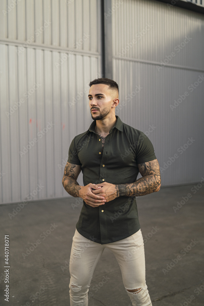 green shirt and white pants