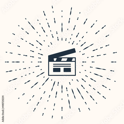 Grey Bollywood indian cinema icon isolated on beige background. Movie clapper. Film clapper board. Cinema production or media industry. Abstract circle random dots. Vector