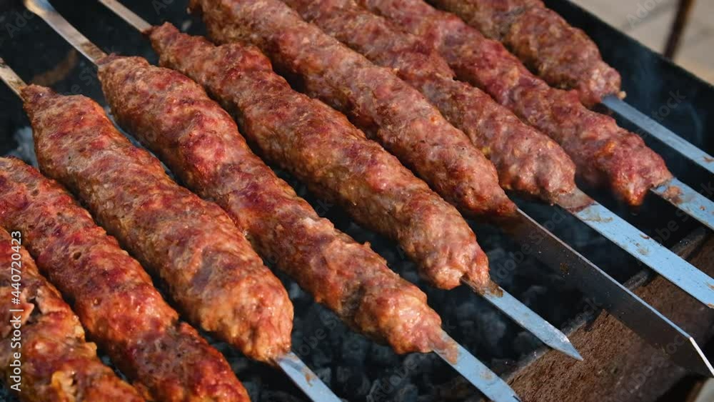 Fry lula kebab on skewers. Selective focus. Fry lula kebab on skewers. Selective focus.