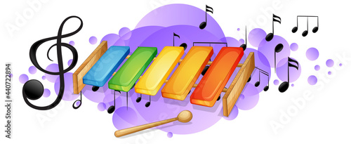 Xylophone musical instrument with melody symbols on purple splotch