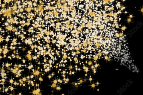 星のパーティクルが飛び散る背景画像