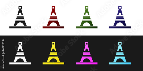 Set Eiffel tower icon isolated on black and white background. France Paris landmark symbol. Vector