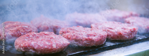 fresh meat burger on the grill close-up. American cuisine