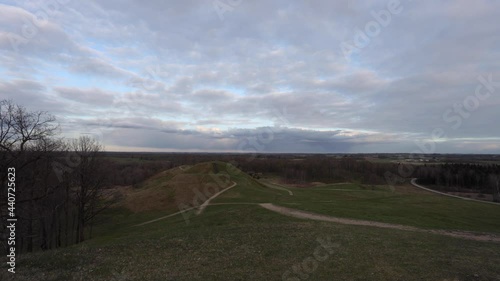 Beautiful view of the Medvegalis mound in spring. Lithuania famous place to visit. Time lapse video. photo
