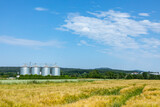 silo at the field for corn under blue sky
