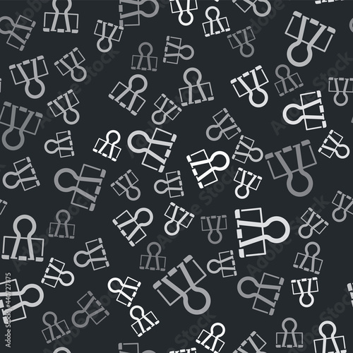 Grey Binder clip icon isolated seamless pattern on black background. Paper clip. Vector