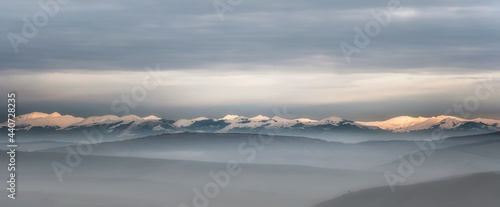 Winter panorama mountains with snow in the distance