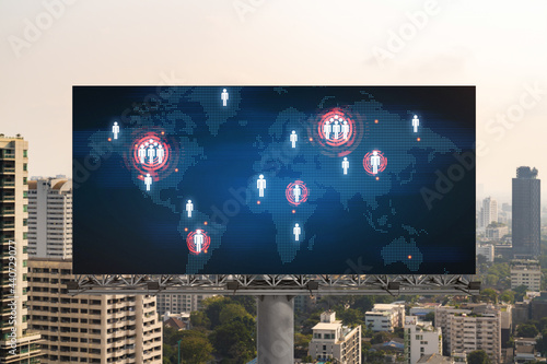 World planet Earth map hologram on billboard over panorama city view of Bangkok. The concept of international connections and business in Southeast Asia.
