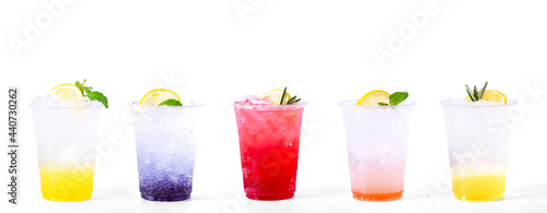 Set of italian soda fruit drink mix with soda. Lemon, blueberry, strawberry, peach and Yuzu orange soda. cocktail summer refreshment drink isolate on white background.