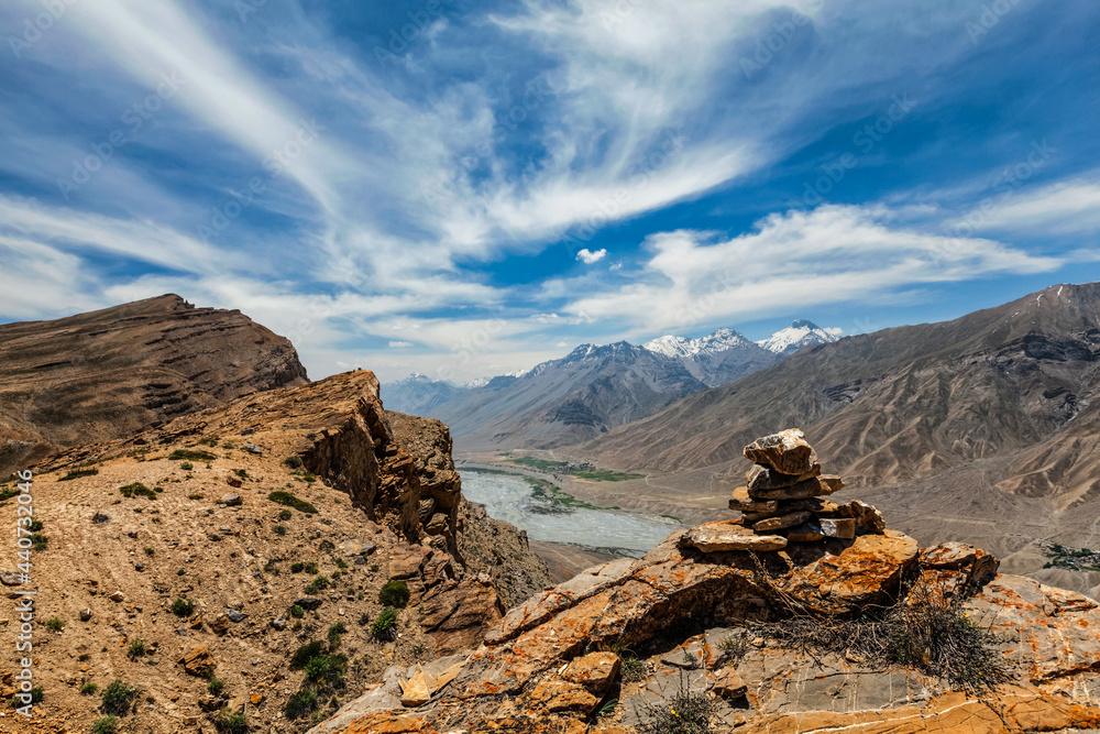 View of Spiti valley Himalayas with stone cairn . Spiti valley, Himachal Pradesh, India