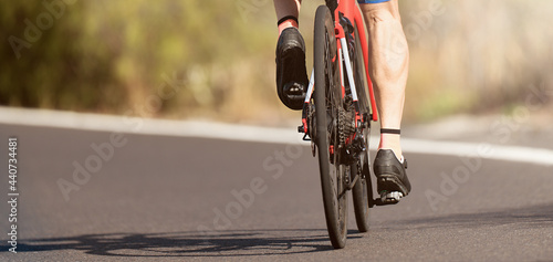 Fototapeta Naklejka Na Ścianę i Meble -  Road bike cyclist man cycling, athlete on a race cycle