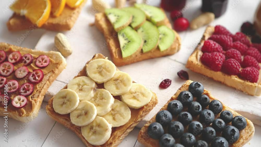 Assortment of healthy fresh breakfast toasts Assortment of healthy fresh breakfast toasts
