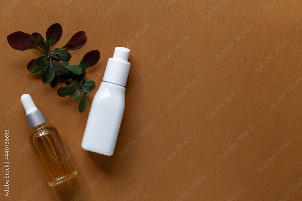 Lotion bottle on yellow background Lotion bottle on yellow background