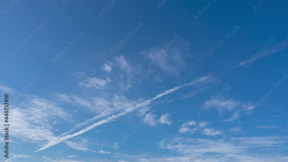 timelapse of blue sky white transparent clouds on sunny summer day. brith day sunshine high in heaven. good air in day time. beautiful cloudy day in atmosphere. clear weather sunny season. timelapse of blue sky white transparent clouds on sunny summer day. brith day sunshine high in heaven. good air in day time. beautiful cloudy day in atmosphere. clear weather sunny season.