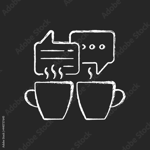 Socializing chalk white icon on dark background. Friends meeting over coffee. Talking over hot cafe drinks. Speech bubbles with cups. Everyday routine. Isolated vector chalkboard illustration on black