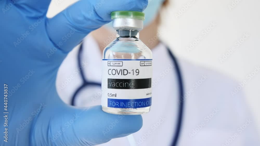 COVID-19 Vaccine in Researcher Hands, Doctor's Hand Holds a Vaccine Ampoule at the Hospital. New Medication Developing, Vaccination. Prevention of flu. High quality 4k footage COVID-19 Vaccine in Researcher Hands, Doctor's Hand Holds a Vaccine Ampoule at the Hospital. New Medication Developing, Vaccination. Prevention of flu. High quality 4k footage