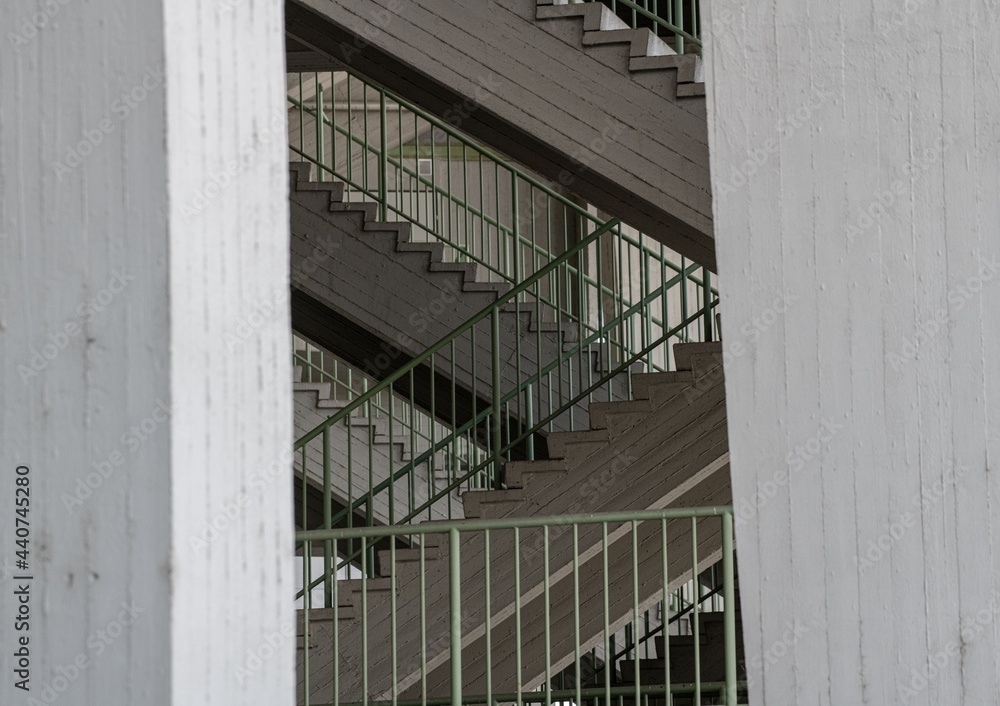 Fototapeta premium outdoor metal and concrete staircase on a stadium building in detailed close up