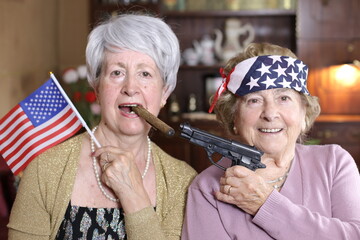 American ladies holding a gun and smoking a cigar