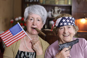 American ladies holding a gun and smoking a cigar 