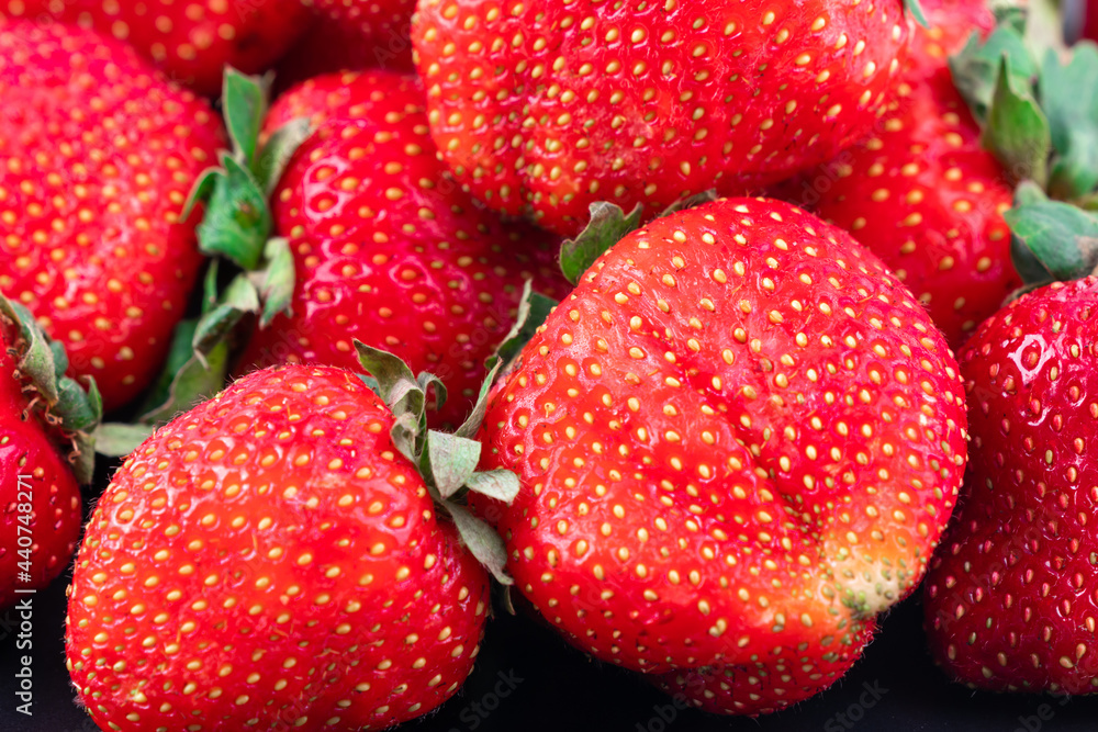 Closeup shot of red ripe strawberries entirely covering the scene. Closeup shot of red ripe strawberries entirely covering the scene.