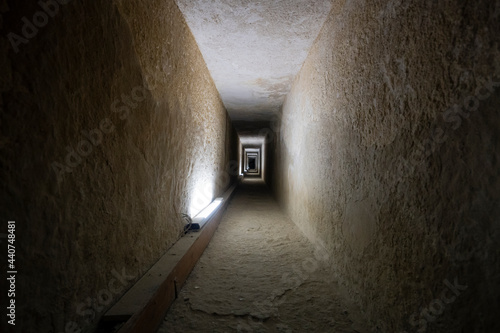 Tunnel entrance to the ancient Egyptian pyramid. A long passage in the pyramid of Giza. A prehistoric landmark. Giza, Cairo, Egypt. inside second pyramid.