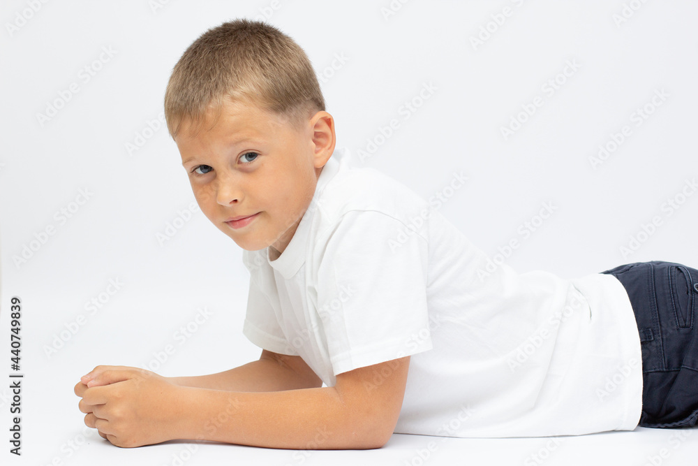 Beautiful Boy Laying Down Isolated on White Background Beautiful Boy Laying Down Isolated on White Background