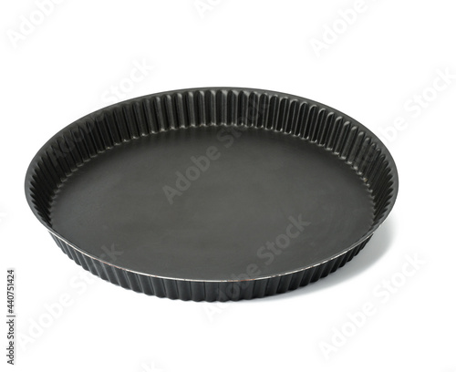 Fototapeta empty black round non-stick cake pan isolated on white background