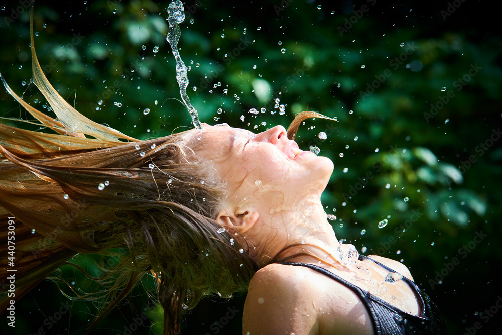 Girl Throwing Wet Hair Backwards. Flipping Her Wet Hair Backwards Out 