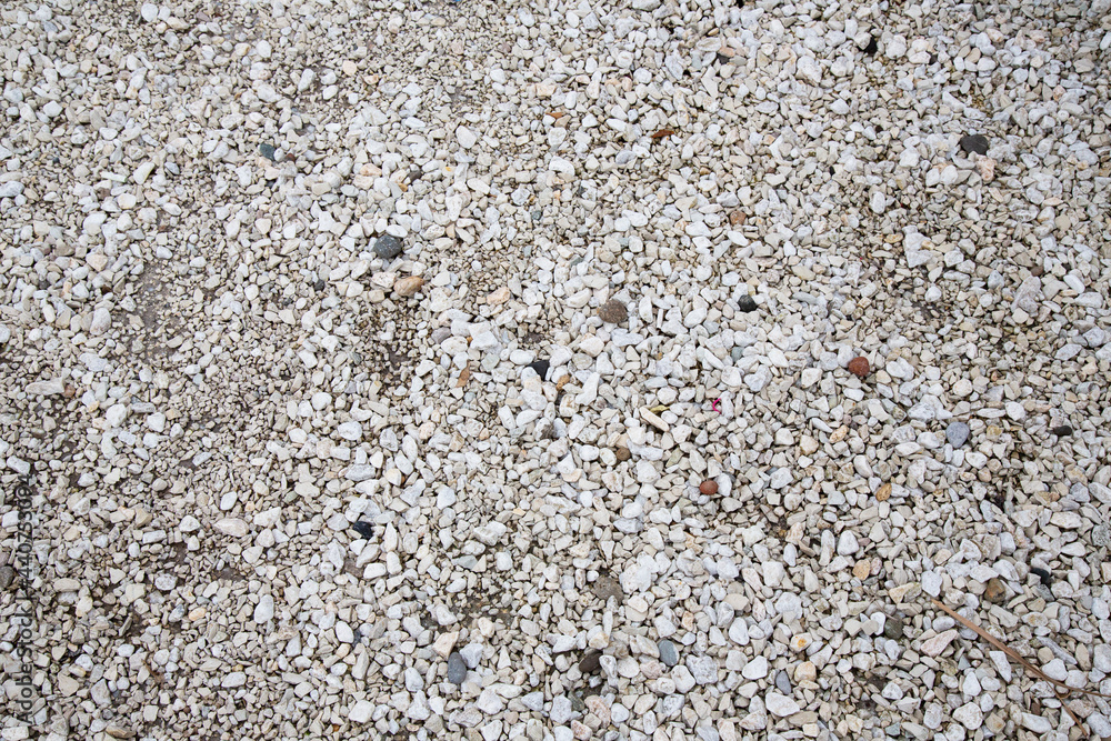 Stone texture. Background texture of small white stones on beach Stone texture. Background texture of small white stones on beach