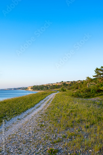 Dirt road next to the ocean