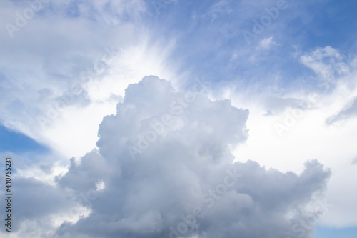 Cloud in the blue sky. A beautiful clouds against the blue sky background. © Olga