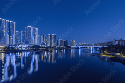 Night view of buildings on the bank of the Jiaomen River in Nansha District, Guangzhou