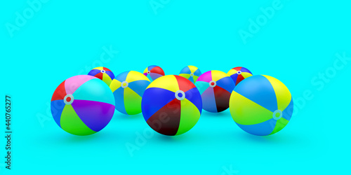 Group of colorful beach balls on blue. 3d illustration 