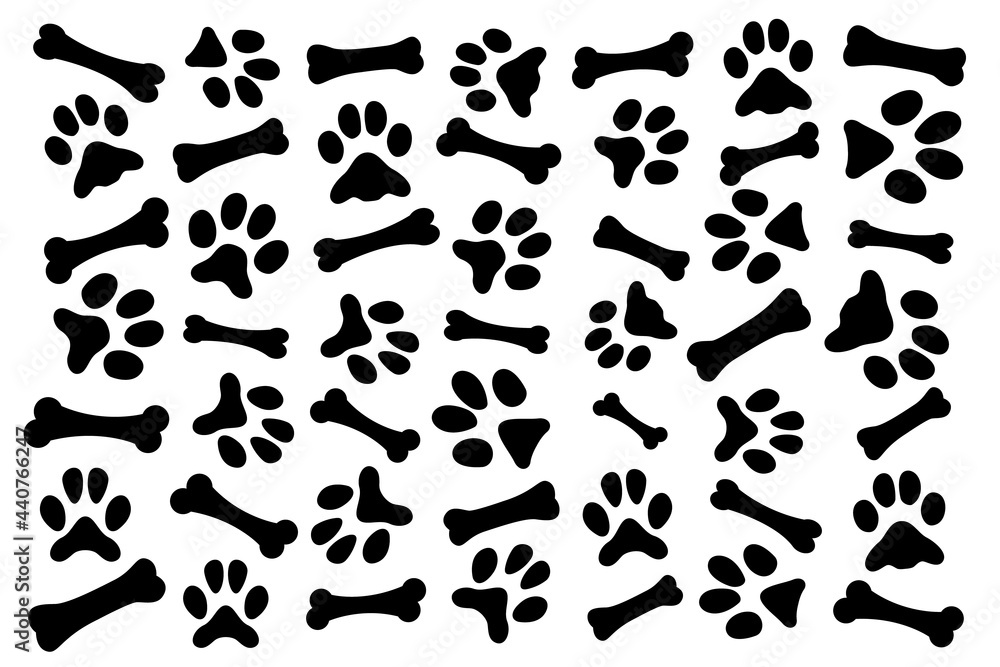 Wallpaper with lots of dog bones and dog footprints. Dog wallpaper.
