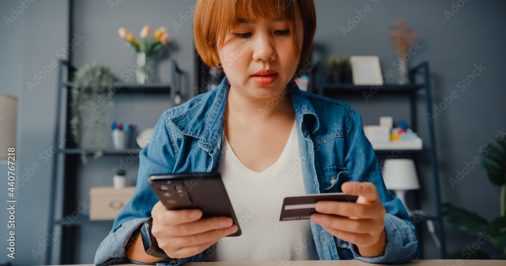 young-asia-lady-use-cellphone-order-online-shopping-product-and-paying